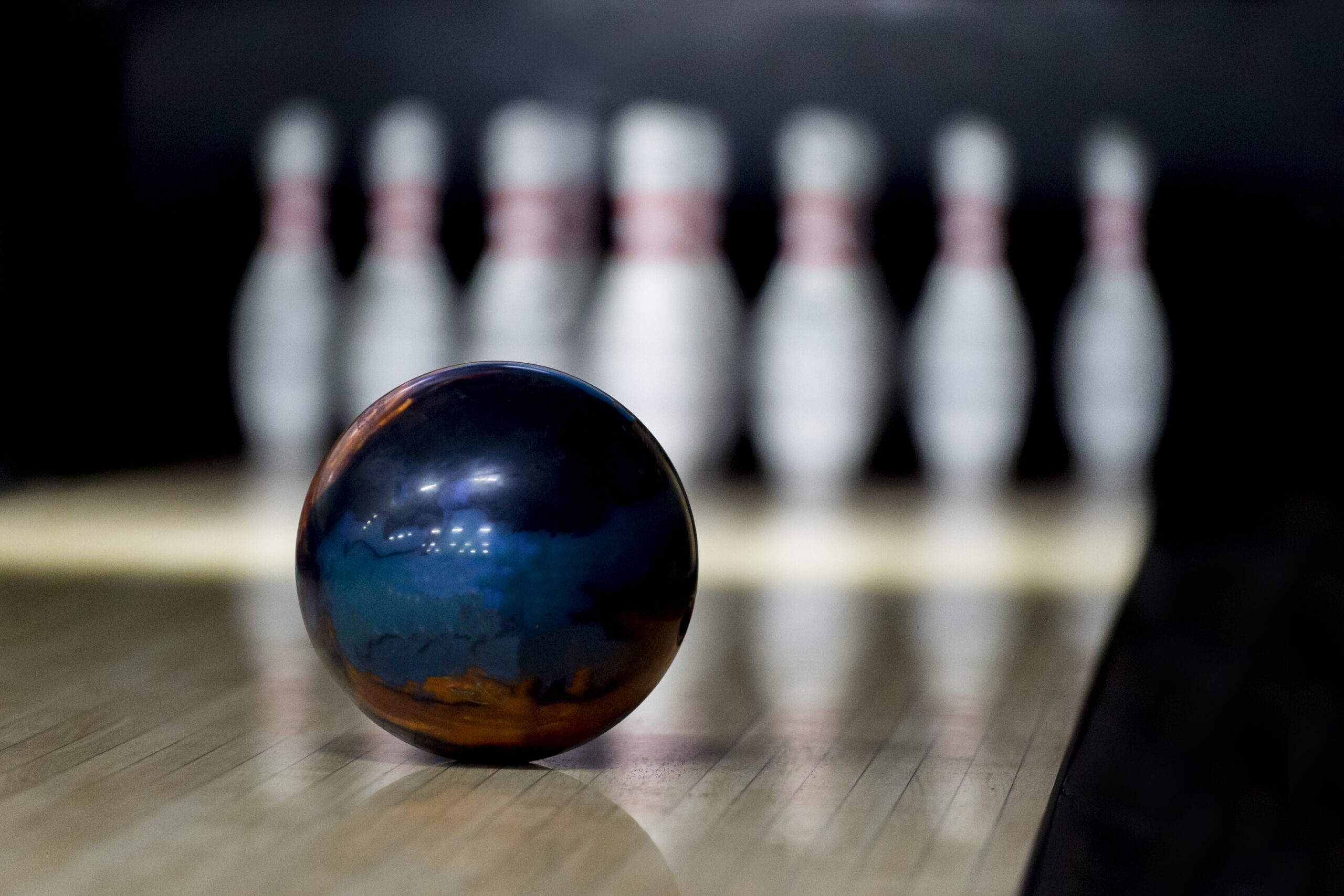 Bowling Ball And Pins On Table